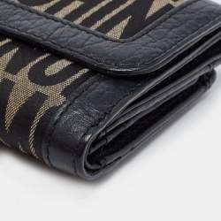 Pre Owned Moschino Black Monogram Canvas and Leather French Flap Wallet