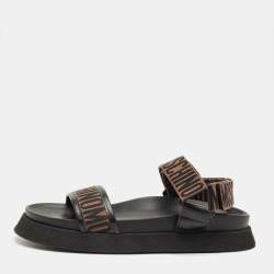 Pre Owned Moschino Brown/Black Canvas Logo Ankle Strap Flat Sandals Size 37