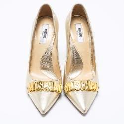 Pre Owned Moschino Metallic Gold Leather Logo Embellished Pointed Toe Pumps Size 36