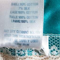 مملوكة مسبقًا فستان اوسكار دي لا رينتا طبقة دانتيل برتقالي وقماش أزرق مخضر بلا حمالات مقاس صغير جداً (اكس سمول)