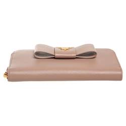 Pre Owned Prada Beige Saffiano Leather Bow Zip Around Wallet