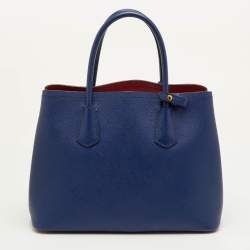 مملوكة مسبقًا حقيبة يد توتس برادا جلد سافيانو كوير صغير ذو مقبض مزدوج باللون الأزرق الداكن