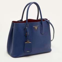 مملوكة مسبقًا حقيبة يد توتس برادا جلد سافيانو كوير صغير ذو مقبض مزدوج باللون الأزرق الداكن