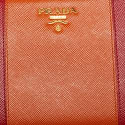 Pre Owned Prada Red/Orange Saffiano Leather Zip Around Wallet