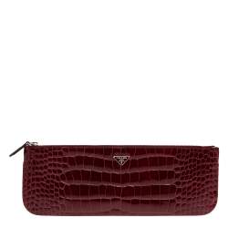 Prada best sale crocodile clutch