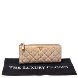 Pre Owned Prada Beige Leather Studded Zip Around Wallet