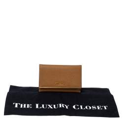 مملوكة مسبقًا حافظة بطاقات برادا قلاب معدن جلد سافيانو بني فاتح