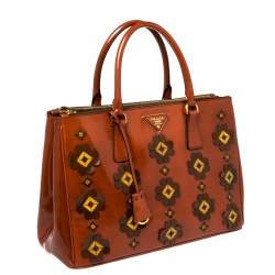 Pre Owned Prada Dark Orange Floral Applique Leather Medium Double Zip Tote