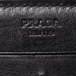 مملوكة مسبقًا محفظة برادا جلد أسود/أحمر لامع بسحاب محيط