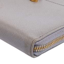 Pre Owned Prada Lilac Saffiano Leather Bow Zip Around Wallet