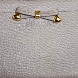 Pre Owned Prada Lilac Saffiano Leather Bow Zip Around Wallet