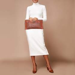 Pre Owned Prada Black/Orange Woven Leather Clutch