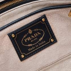 Pre Owned Prada Black/Orange Woven Leather Clutch