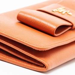 Pre Owned Prada Orange Saffiano Lux Leather Bow Flap Continental Wallet