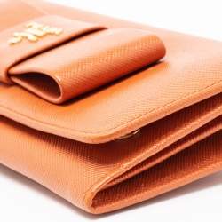 Pre Owned Prada Orange Saffiano Lux Leather Bow Flap Continental Wallet