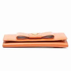 Pre Owned Prada Orange Saffiano Lux Leather Bow Flap Continental Wallet