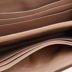 Pre Owned Prada Beige Saffiano Leather Zip Around Wallet