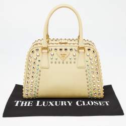 Pre Owned Prada Light Yellow Saffiano Lux Patent Leather Studded Pyramid Frame Satchel