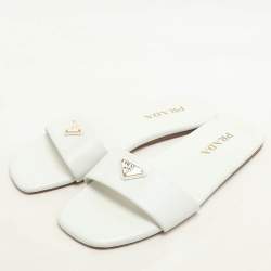 مملوكة مسبقًا Prada White Leather Logo Embellished Flat Slides Size 38