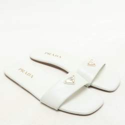 مملوكة مسبقًا Prada White Leather Logo Embellished Flat Slides Size 38