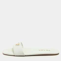 مملوكة مسبقًا Prada White Leather Logo Embellished Flat Slides Size 38