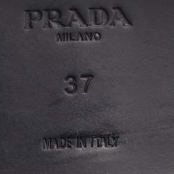 مملوكة مسبقًا حذاء لوفرز سليب أون ببرادا مثلث شعار جلد لامع أسود مقاس 37