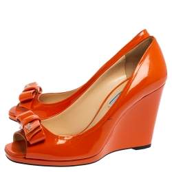 Pre Owned Prada Orange Patent Leather Bow Peep Toe Wedge Pumps Size 39.5