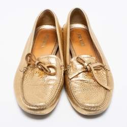 Pre Owned Prada Gold Leather Bow Slip-On Loafers Size 38.5