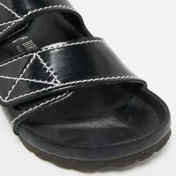 مملوكة مسبقًا صندل برونزا شولر x بيركنستوك جلد أسود مسطح بحزام خلفي مقاس 38