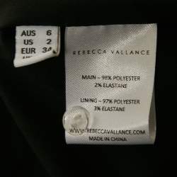 مملوكة مسبقًا فستان ريبيكا فالانس كريب أسود بقصة ميدي إيمان مقاس صغير