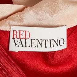 Pre Owned توب رد فالنتينو أحمر كريب برقبة متباينة ورباط تفاصيل بلا أكمام مقاس متوسط - ميديم