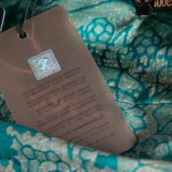 مملوكة مسبقًا تنورة روبرتو كافالي حرير مطبوع أخضر حافة منفوشة مقاس متوسط (ميديوم)