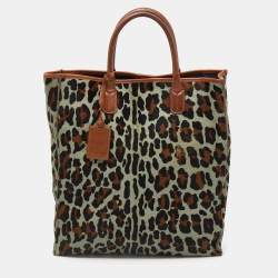 مملوكة مسبقًا حقيبة يد روبرتو كافالي شعر عجل نقشة فهد وجلد متعددة الألوان 