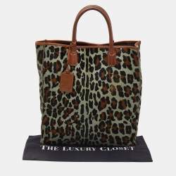 مملوكة مسبقًا حقيبة يد روبرتو كافالي شعر عجل نقشة فهد وجلد متعددة الألوان 