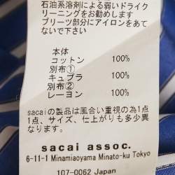 مملوكة مسبقًا بلوزة ساكاي قطن مخطط أزرق واسعة مقاس متوسط