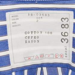 مملوكة مسبقًا بلوزة ساكاي قطن مخطط أزرق واسعة مقاس متوسط