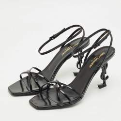 مملوكة مسبقًا صندل سان لوران باريس أوبن سير أبيوم بكعب ومشبك جلدي أسود مقاس 39.5