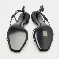 مملوكة مسبقًا صندل سان لوران باريس أوبن سير أبيوم بكعب ومشبك جلدي أسود مقاس 39.5