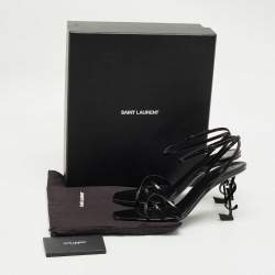 مملوكة مسبقًا صندل سان لوران باريس أوبن سير أبيوم بكعب ومشبك جلدي أسود مقاس 39.5