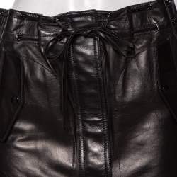 مملوكة مسبقًا تنورة سان لوران جلد أسود مزينة رباط بشراشيب قصيرة مقاس صغير (سمول)