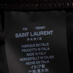 مملوكة مسبقًا تنورة سان لوران جلد أسود مزينة رباط بشراشيب قصيرة مقاس صغير (سمول)