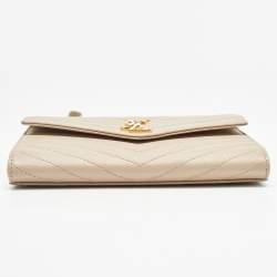 Pre Owned Saint Laurent Beige Matelasse Leather Cassandre Wristlet Pouch
