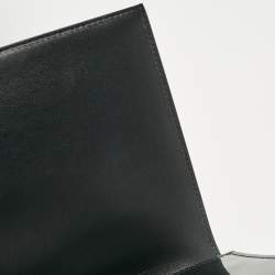 Pre Owned Saint Laurent Black Patent Leather Cassandre Flap Wristlet Clutch