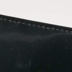 Pre Owned Saint Laurent Black Patent Leather Cassandre Flap Wristlet Clutch