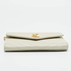 مملوكة مسبقًا Saint Laurent Off White Matelasse Leather Cassandre Wristlet Clutch