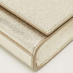 Pre Owned Saint Laurent Gold Leather Cassandre Clutch
