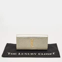 Pre Owned Saint Laurent Gold Leather Cassandre Clutch