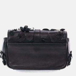 مملوكة مسبقًا حقيبة كلاسيكية سان لوران جلد حملان صغير/خرز مضغوطة بمونوغرام