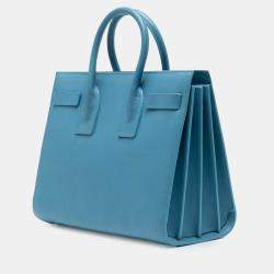 مملوكة مسبقًا حقيبة سان لوران بباريس ساك دي جور يد صغيرة جلد زرقاء