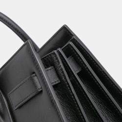 مملوكة مسبقًا حقيبة سان لوران باريس ساك دو جور مزينة برقعة جلد سوداء بايبي